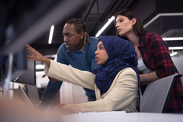 Image showing multiethnics team of software developers working together