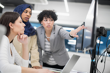 Image showing multiethnics team of software developers working together