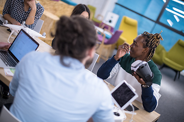 Image showing Young Multiethnic Business team using virtual reality headset