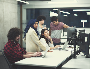 Image showing multiethnics team of software developers working together