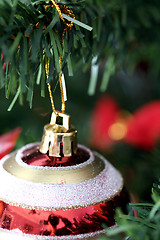 Image showing Christmas ornaments on tree.