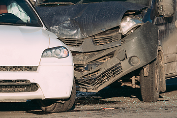 Image showing Collision Of Two Cars. Crashed Minibus And Luxury Crossover SUV Cars In City Street. Car Wreck, Accident. Collision Of Two Cars. Crashed Minibus And Luxury Crossover SUV Cars In City Street. Car Wrec