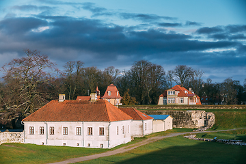 Image showing Kuressaare, Saaremaa Island, Estonia. Old House Building Near Episcopal Castle In Evening. Traditional Medieval Architecture, Famous Attraction Landmark
