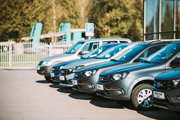 Image showing Lada Vesta, Granta Cars Parked In Row Near Dealership