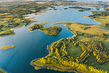 Image showing Braslaw Or Braslau, Vitebsk Voblast, Belarus. Aerial View Of Nedrava Lake And Green Forest Landscape In Sunny Autumn Morning. Top View Of Beautiful European Nature From High Attitude. Bird\'s Eye View