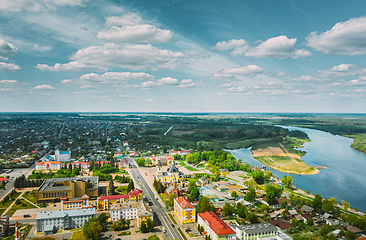 Image showing Rechytsa, Belarus. Aerial View Of Residential Houses And Famous Landmarks Of Town: Holy Assumption Cathedral And Holy Trinity Church In Sunny Summer Day.