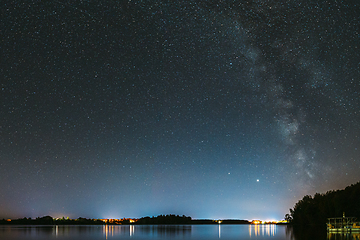 Image showing Village Novoye Lyadno, Lyepyel District, Vitebsk Province, Belarus. Real Colorful Night Stars Above Lepel Lake. Natural Starry Sky Background Backdrop Landscape