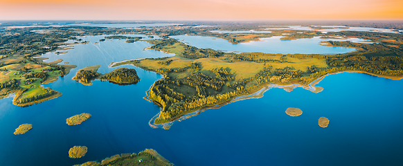 Image showing Braslaw Or Braslau, Vitebsk Voblast, Belarus. Aerial View Of Nedrava Lake And Green Forest Landscape In Sunny Summer Morning. Top View Of Beautiful European Nature From High Attitude. Bird\'s Eye View