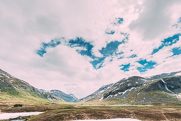 Image showing Reinheimen National Park, Norway. Mountains Landscape In Early Summer. Mountain Range In One Of The Largest Wilderness Areas Still Intact In Western Norway