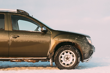 Image showing Grungy And Frozen SUV Car On Roadside At Winter Day