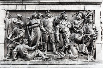 Image showing Minsk, Belarus. Bas-relief Scenes On Wall Of Stele Dedicated To Memory Of The Great Patriotic War. Victory Square