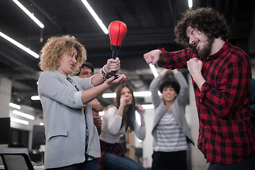 Image showing multiethnics business team boxing at office