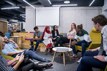 Image showing Multiethnic startup business team having meeting