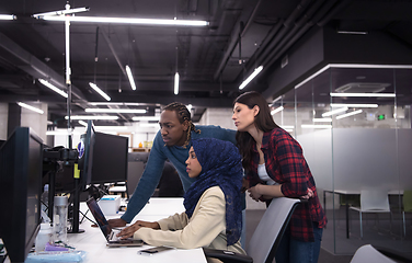 Image showing multiethnics team of software developers working together