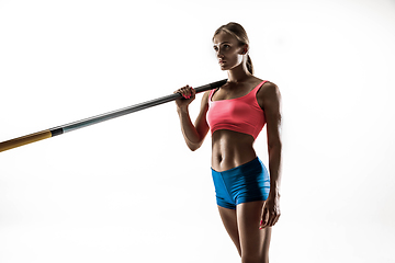 Image showing Female pole vaulter training on white studio background