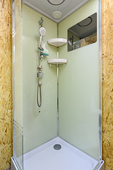 Image showing Shower stall with cracked glass, located in a country house