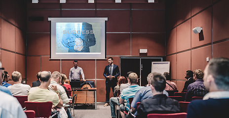 Image showing Business speaker giving a talk at business conference meeting event.