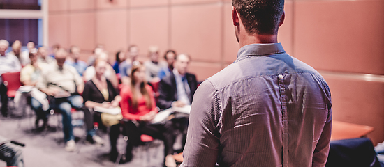 Image showing Public speaker giving talk at Business Event.