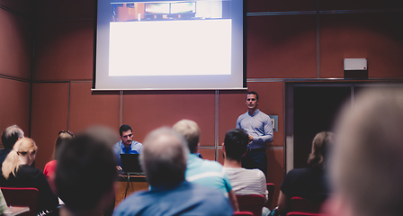 Image showing Business speaker giving talk at business conference event.