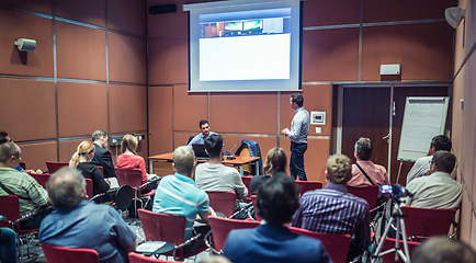 Image showing Business speaker giving talk at business conference event.