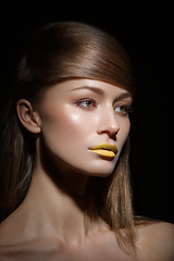 Image showing beautiful girl with yellow lips