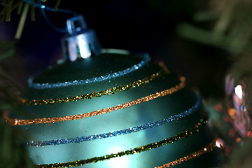 Image showing Christmas ornaments on tree.