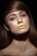 Image showing beautiful girl with yellow lips