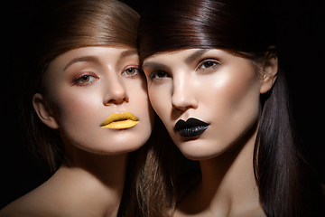 Image showing beautiful girls with yellow and black lips