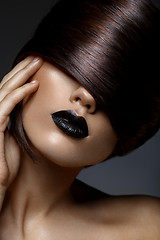 Image showing beautiful girl with black lips