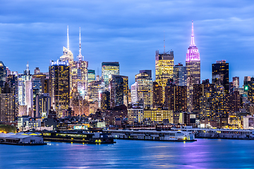 Image showing West New York City midtown Manhattan skyline view from Boulevard East Old Glory Park over Hudson River at dusk.