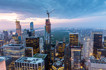 Image showing New York City skyline with urban skyscrapers at sunset, USA.