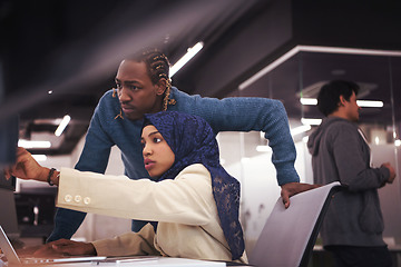 Image showing young black muslim female software developer at work