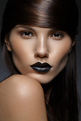 Image showing beautiful girl with black lips