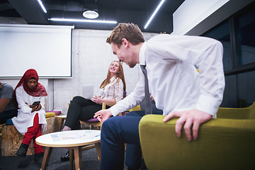 Image showing Multiethnic startup business team having meeting