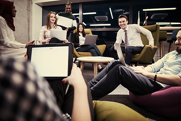 Image showing Multiethnic startup business team having meeting