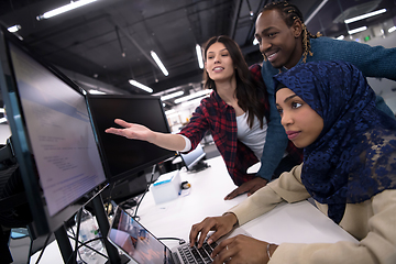 Image showing multiethnics team of software developers working together