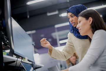 Image showing multiethnics team of software developers working together