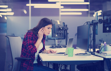 Image showing female software developer using laptop computer