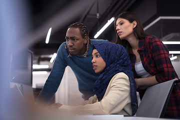 Image showing multiethnics team of software developers working together