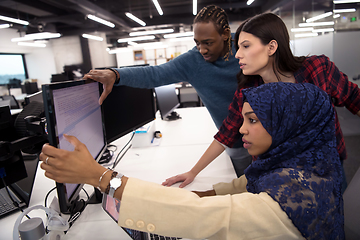 Image showing multiethnics team of software developers working together