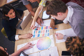 Image showing Multiethnic startup business team having meeting