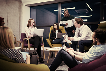 Image showing Multiethnic startup business team having meeting