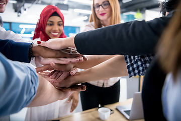 Image showing multiethnic Group of young business people celebrating success