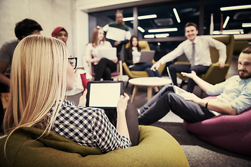 Image showing blonde businesswoman using digital tablet