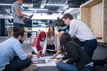 Image showing black muslim woman having meeting with Multiethnic  startup busi