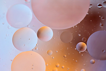 Image showing Colorful abstract background with oil drops on water