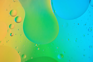 Image showing Colorful abstract background with oil drops on water