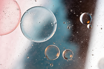 Image showing Colorful abstract background with oil drops on water