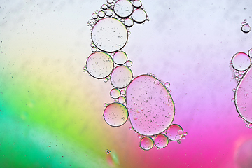 Image showing Colorful abstract background with oil drops on water