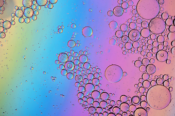 Image showing Colorful abstract background with oil drops on water